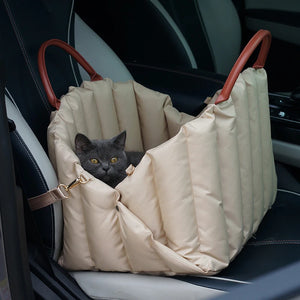 Travel Booster «Voyage» in dark khaki — side view of the padded booster seat